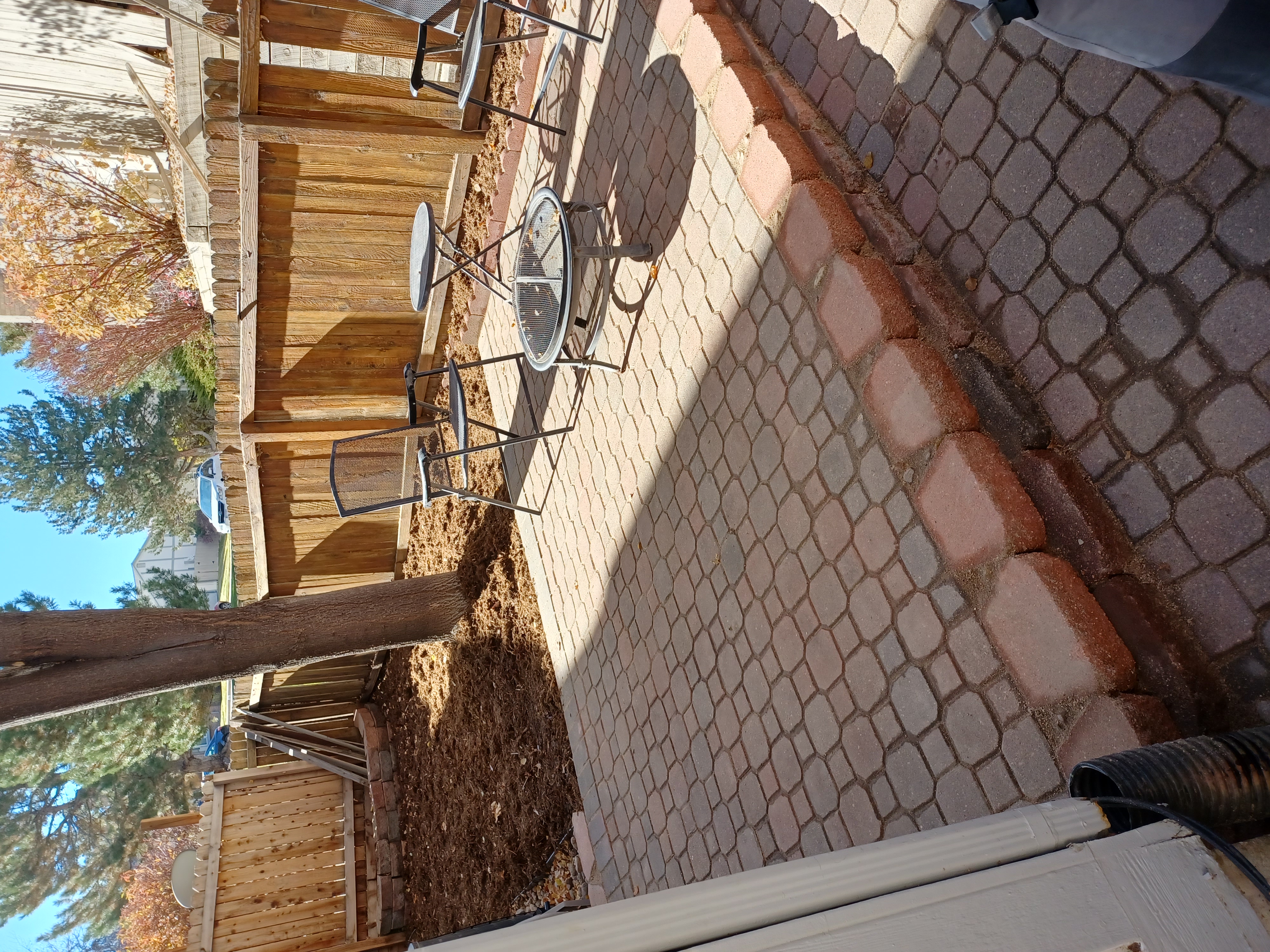 After Landscaping Project - Professional Paver Installation and Mulch Design